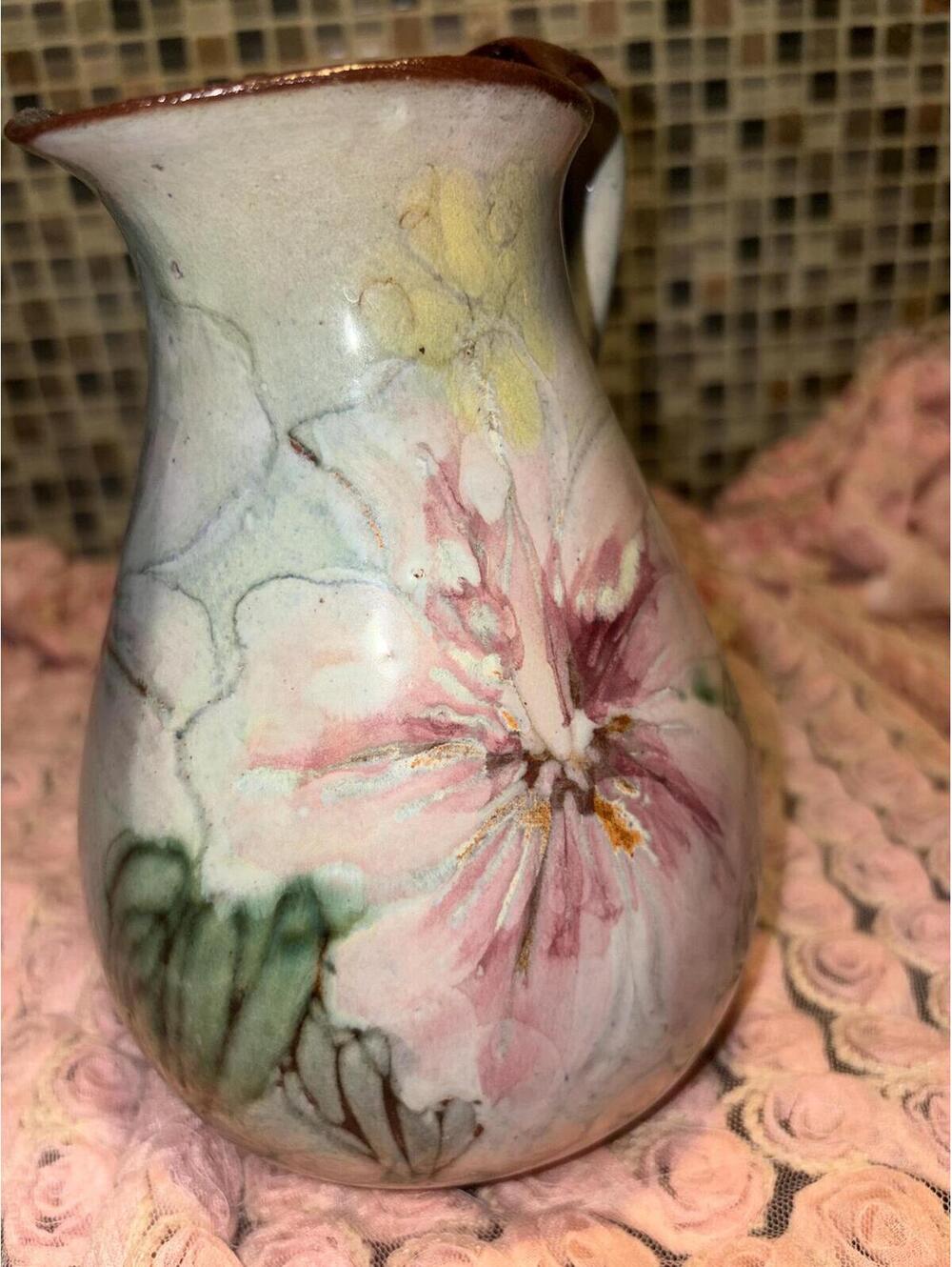 mid-century studio art pottery k with a reactive green glaze.